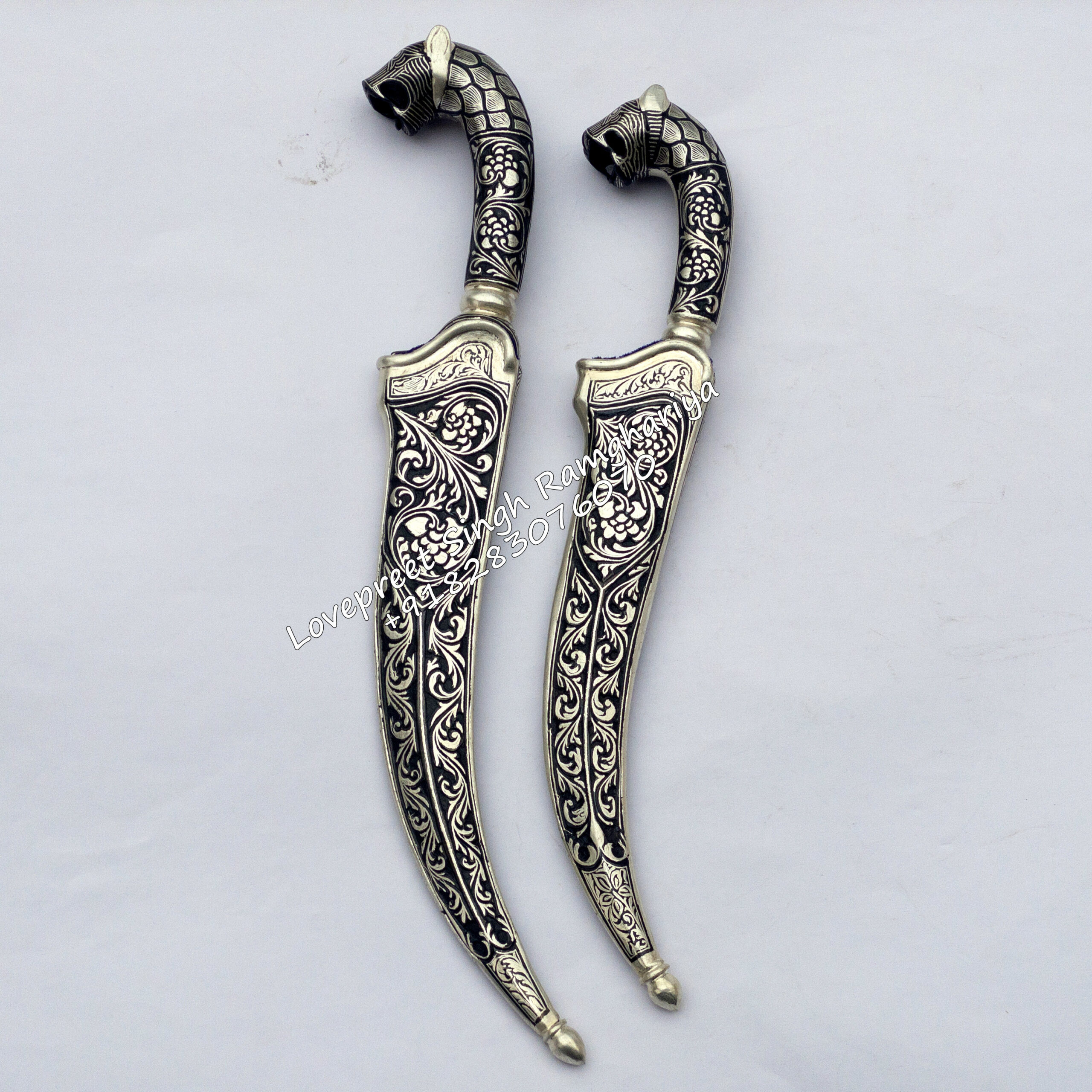 Lion Head Kirpan with Silver koftgiri Lion Head Kirpan with Silver koftgiri